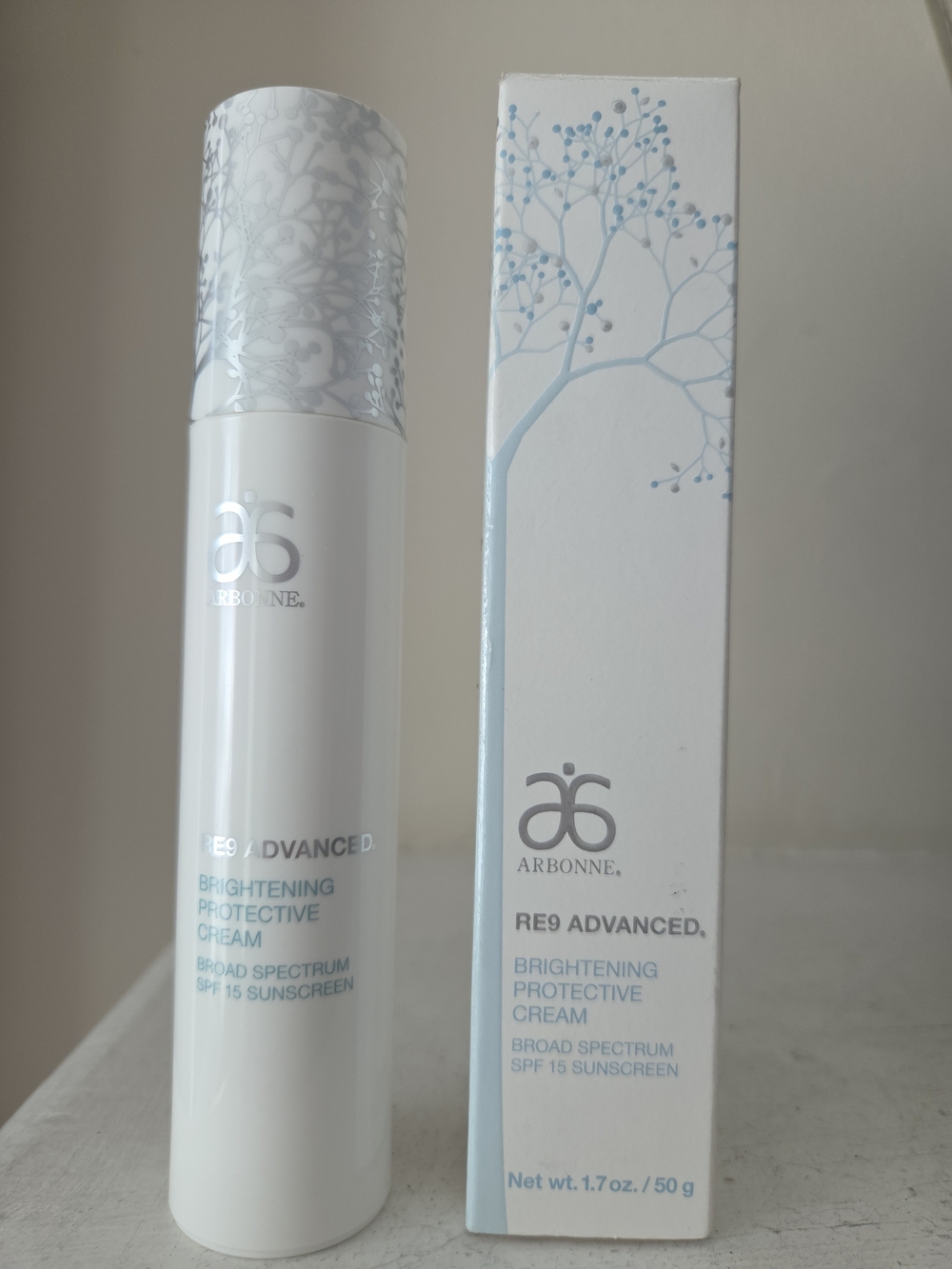 Arbonne RE9 Advanced Brightening Protective Cream Broad Spectrum SPF 15 1.7oz ⬇️